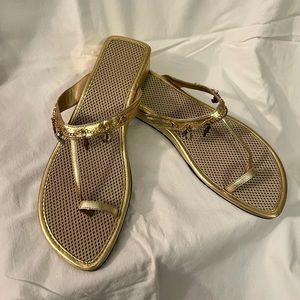 Women’s gold Ocean Treasures Sandals sold by Avon. Size 9.